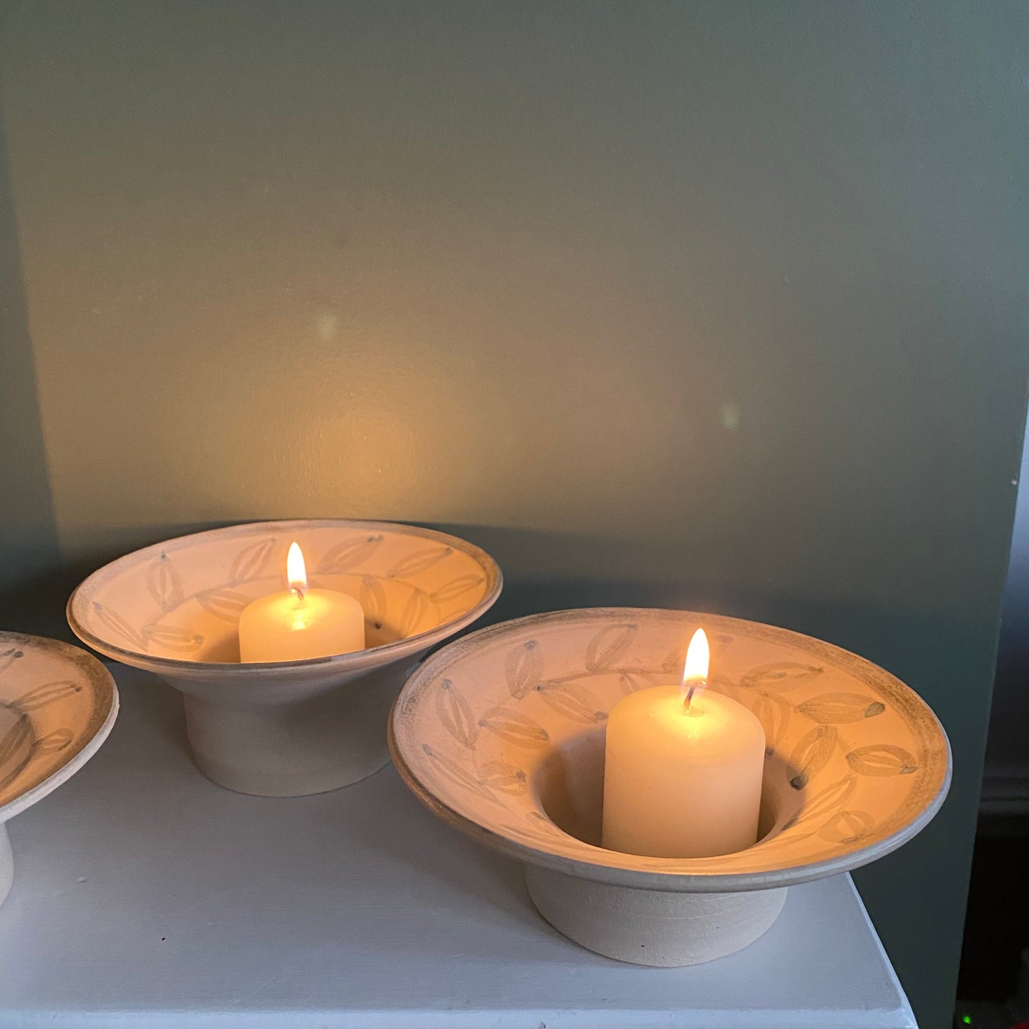 Tea light holder bowls, with flared rim and leaf pattern, blue grey and neutral off white