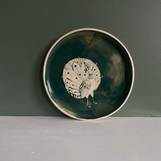 Peacock small Stoneware plate with Bird Illustrated round dark teal colour with bird line illustration.